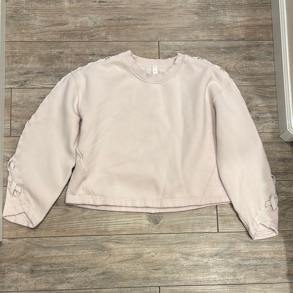 Lululemon Light Pink Cropped Sweatshirt with Lace-Up Sleeves Size 8 - Picture 1 of 7